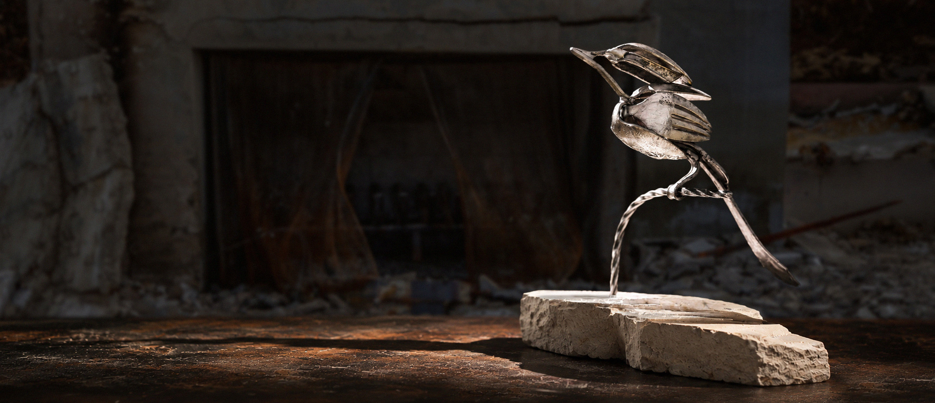 Bird sculpture on a stone base